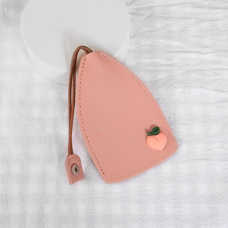 Cartoon-themed PU leather car key case with pull-out mechanism measuring 14x7.5 cm