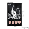 24 black French style false nails with short almond shapes laid out on a surface.