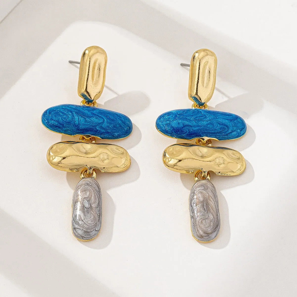 Geometric zinc alloy stud earrings with electroplated multicolour finish