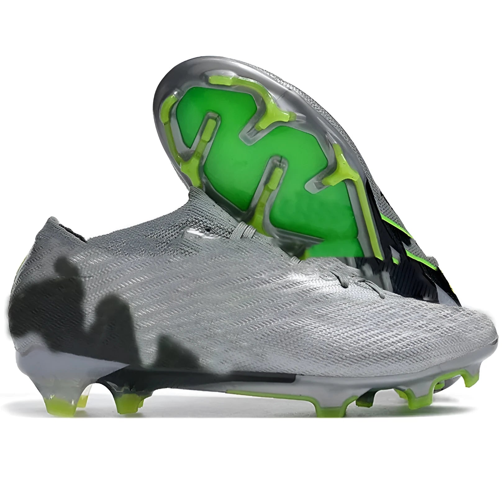 Men's black football shoes with knitted upper, lace-up closure, and rubber FG stud sole