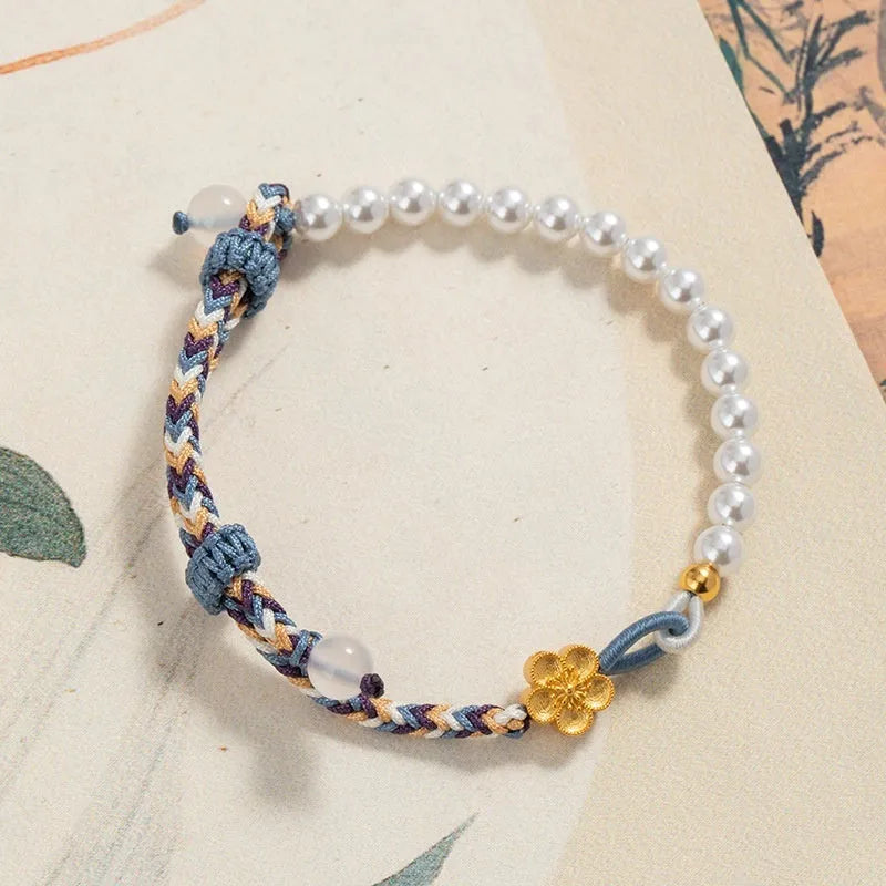 Peach-coloured Chinese flower weaving carrying strap with sterling silver electroplating and pearl details