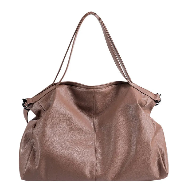 Large soft black PU leather messenger bag with adjustable shoulder strap and front zip.