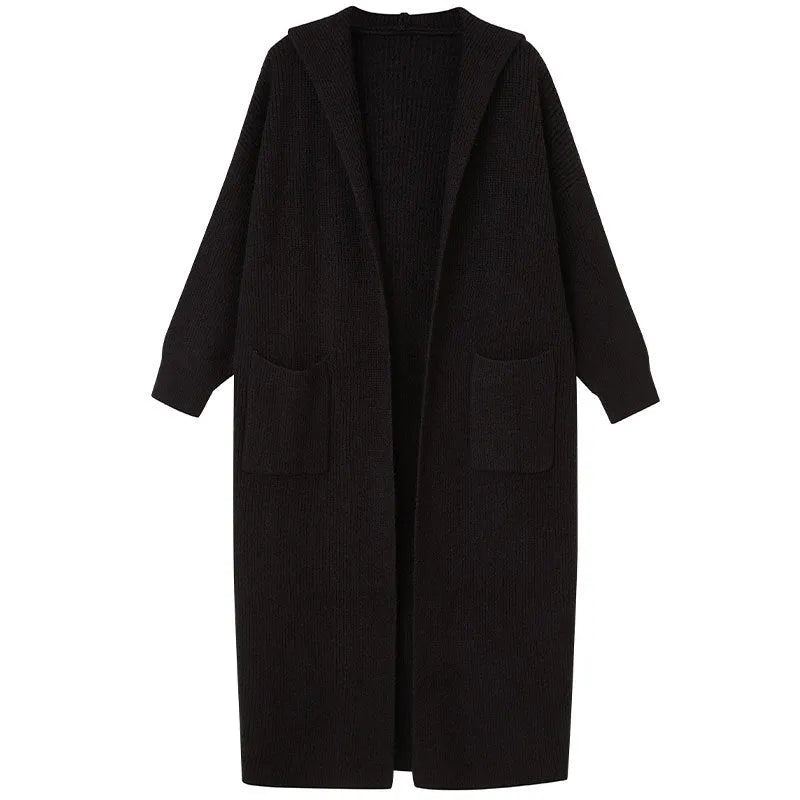 Long grey knitted women's cardigan with a hood, styled like a trench coat with long sleeves.