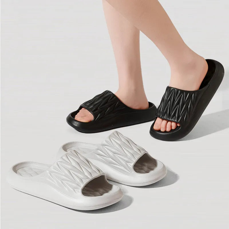 Leaf texture design EVA household slippers in multiple colours on a white background.