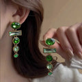 Green gradient alloy earrings with geometric tassel design and inlaid zircon details
