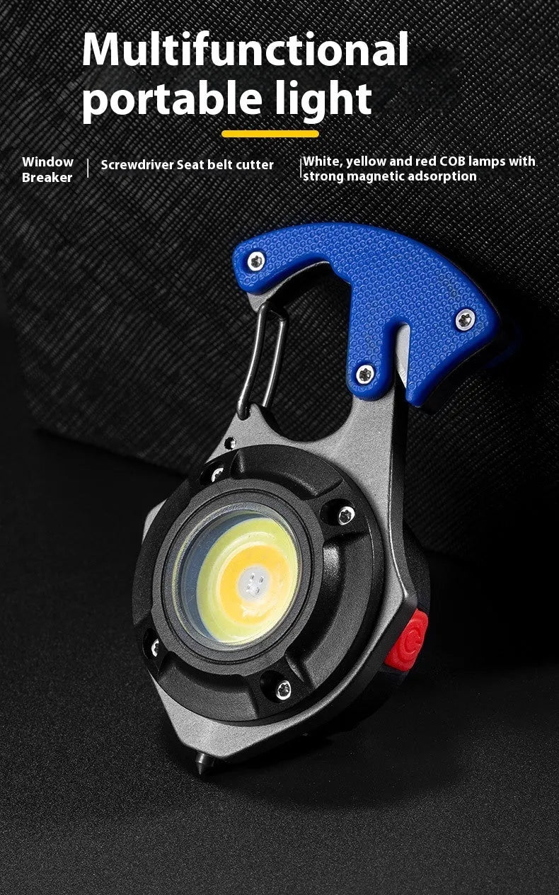 Compact silver and black multifunction keychain torch with window breaker tip and seven LED light modes.