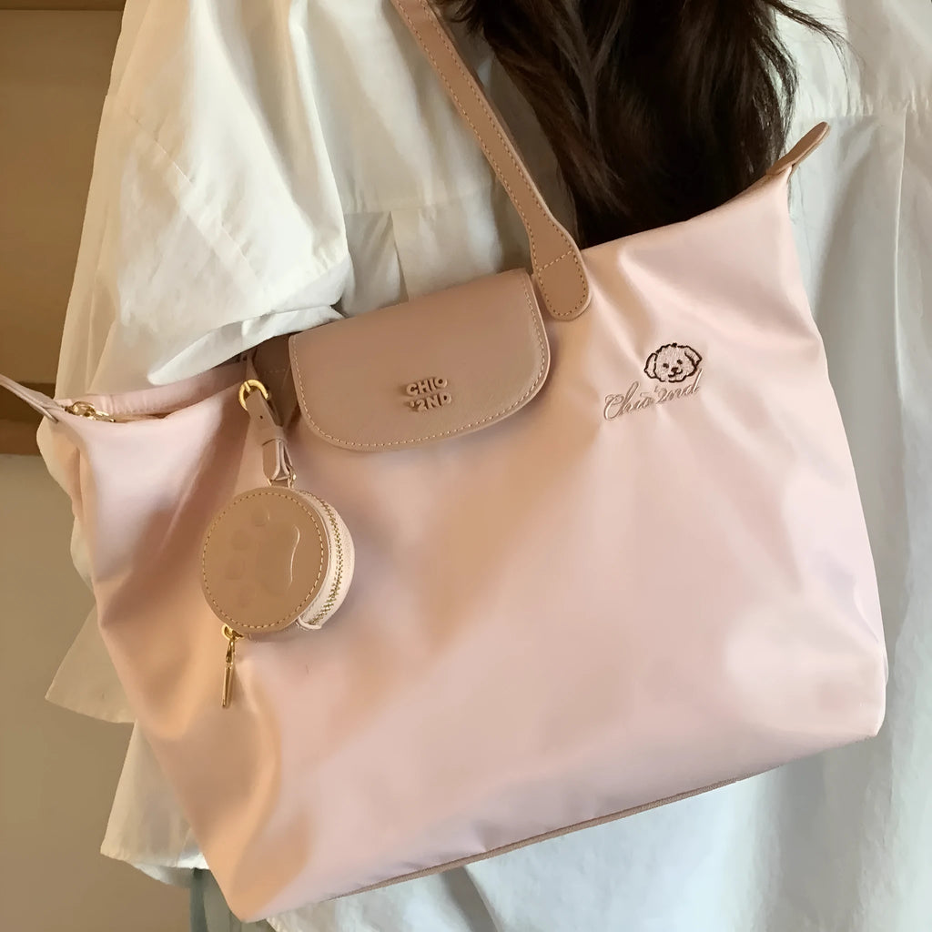 Oxford cloth tote shoulder bag in pink with horizontal square shape and sandwich pocket design