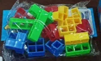 Plastic balance stacking game with 16 coloured building blocks on chassis
