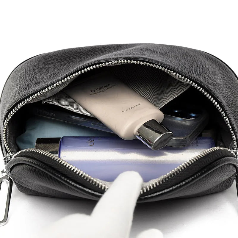 Women's saddle-shaped messenger bag in PU leather with single shoulder strap and sandwich pocket