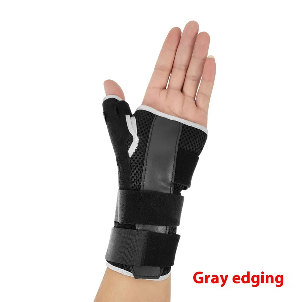 Black carbon fibre pattern wrist guard with grey edging and a white thumb strap, shown on a left hand.
