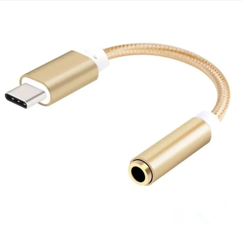 Nylon braided Type-C to 3.5mm female audio adapter cable in black, shown next to a mobile phone.