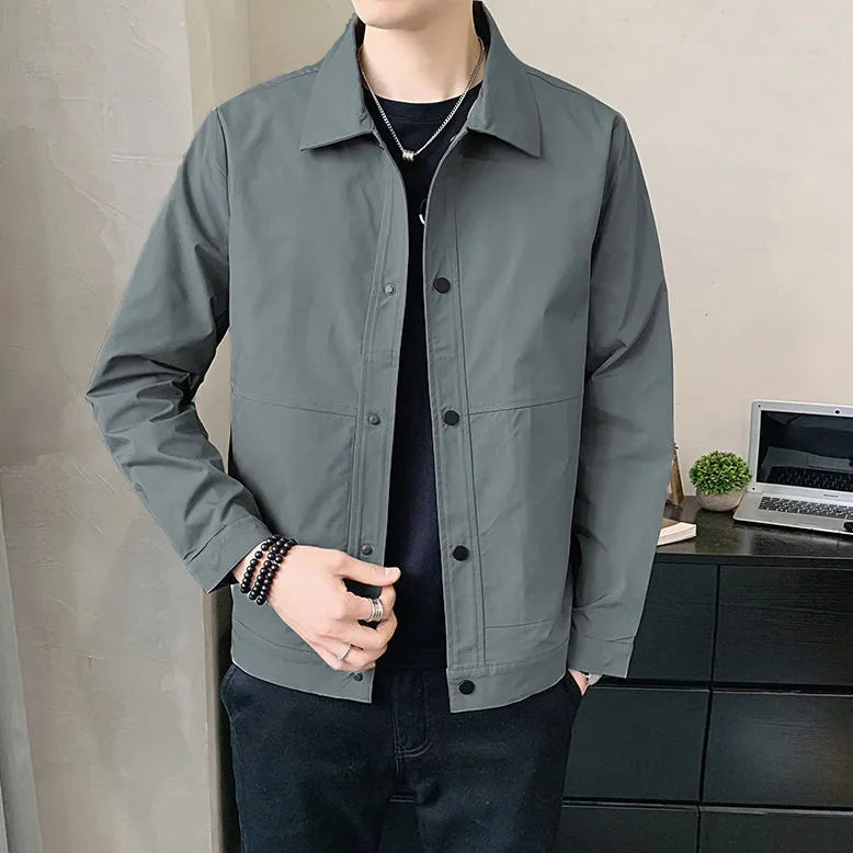Men's Korean style single-layer polyester jacket in light grey, shown on a model.