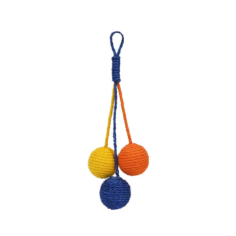 Four-piece cat toy set with teaser stick, catnip ball, and self-play toys on blue background