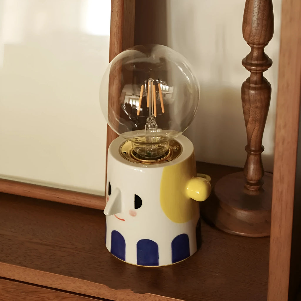 Handmade ceramic bedside lamp with ball headlight decorative design