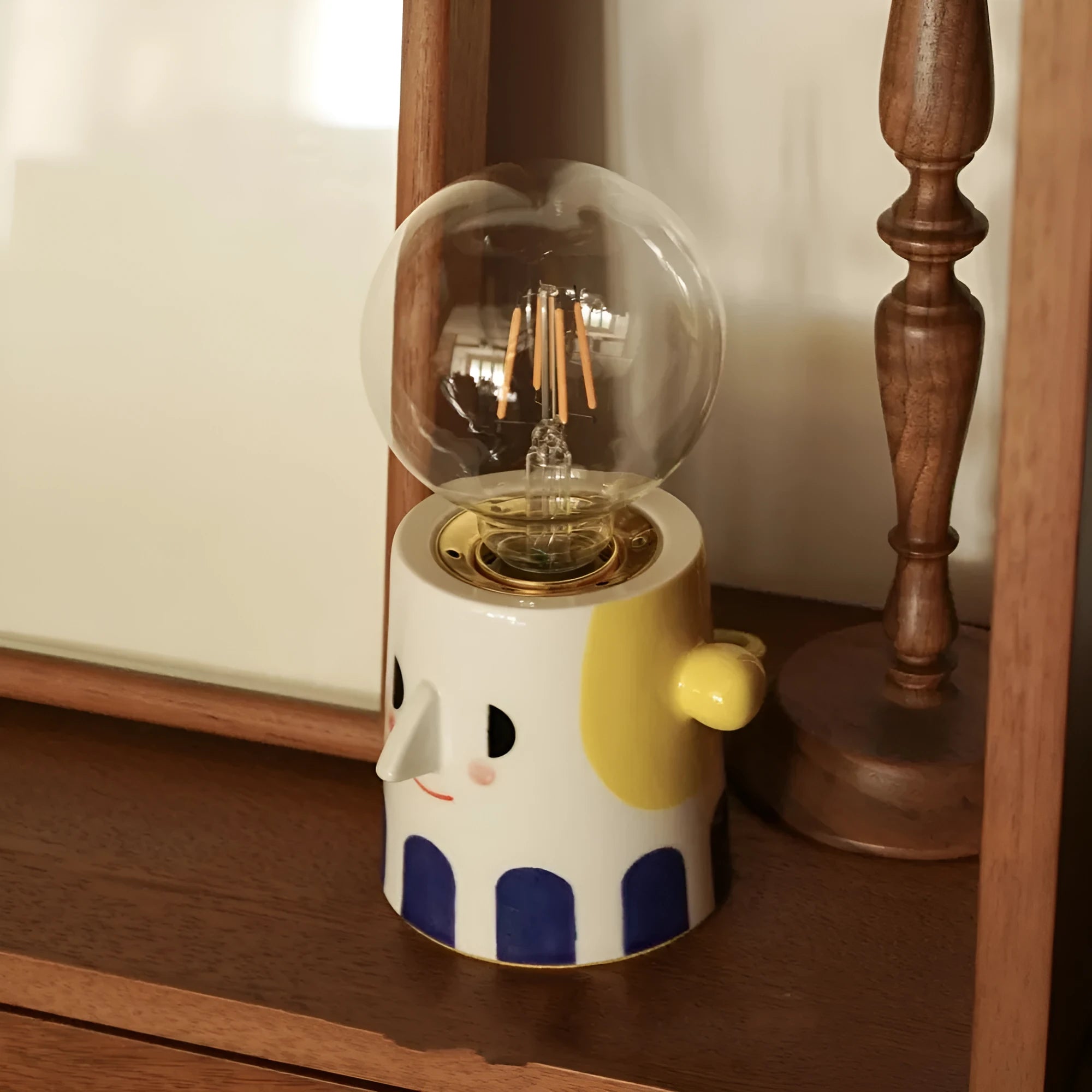Handmade ceramic bedside lamp with ball headlight decorative design