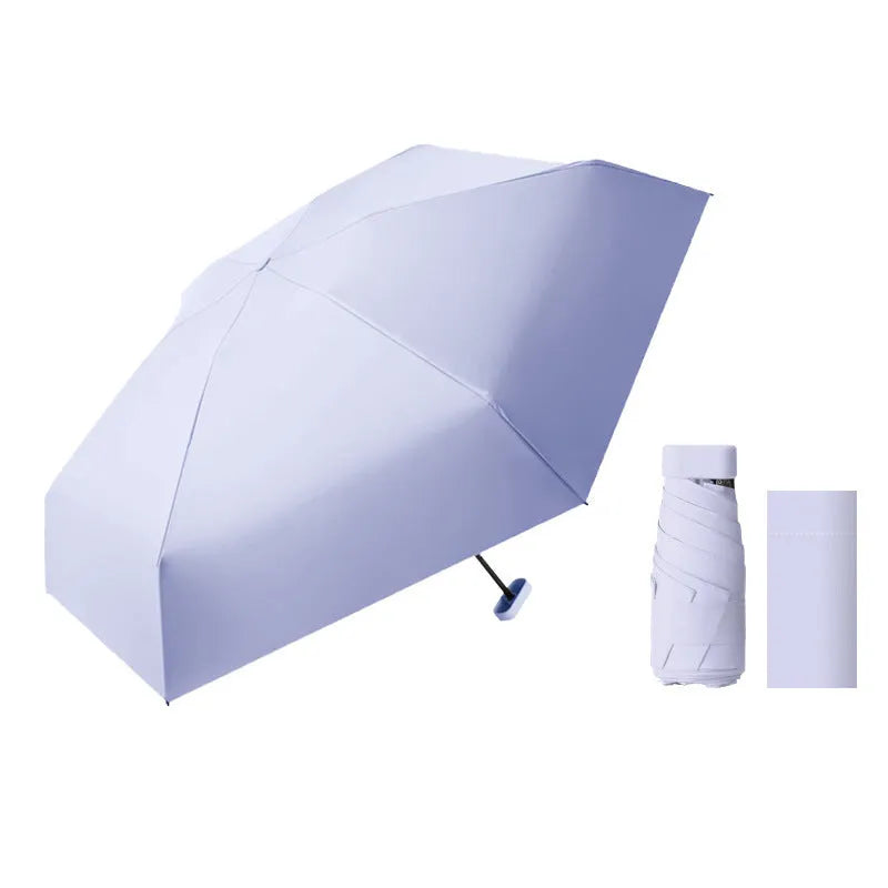 Six-fold ultra-light sun umbrella in sky blue with steel frame and fabric cover