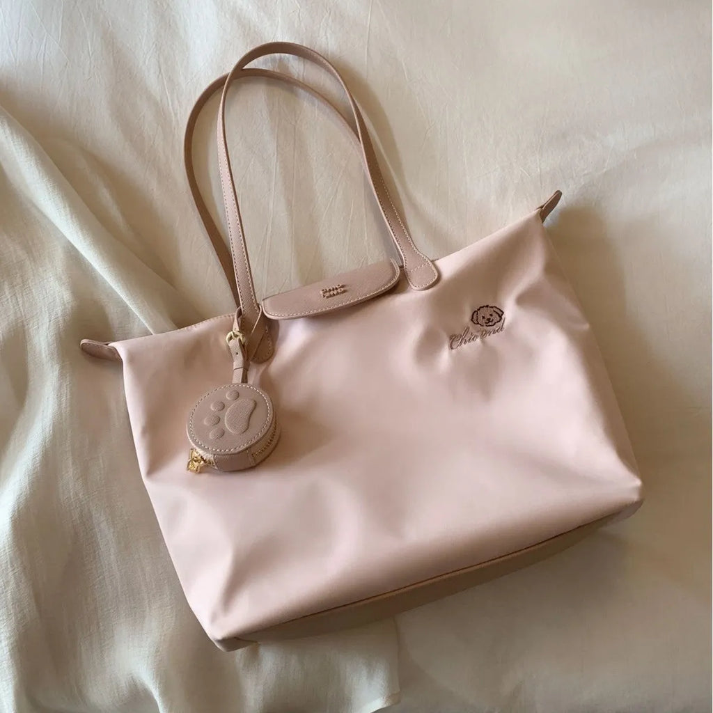 Oxford cloth tote shoulder bag in pink with horizontal square shape and sandwich pocket design