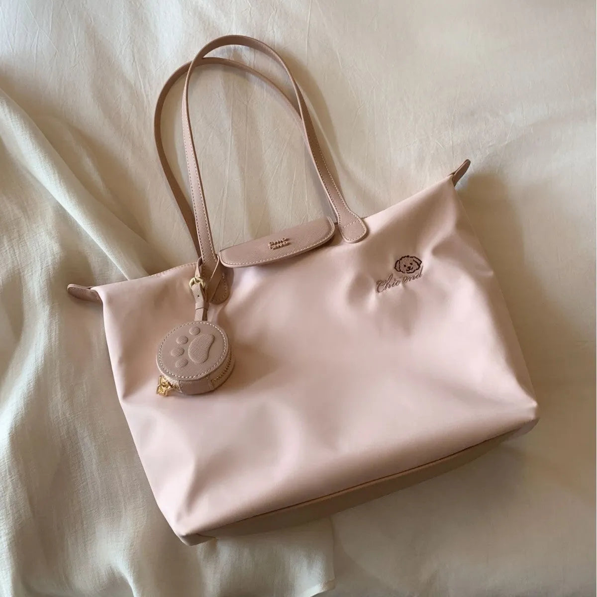 Oxford cloth tote shoulder bag in pink with horizontal square shape and sandwich pocket design