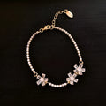 Women's gold-tone copper bracelet with geometric quadrilateral design and inlaid zircon stones