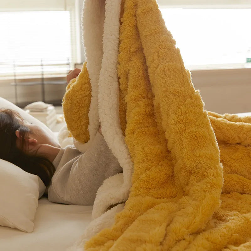 Polyester thermal flannel winter blanket in beige colour showing taffeta weave texture