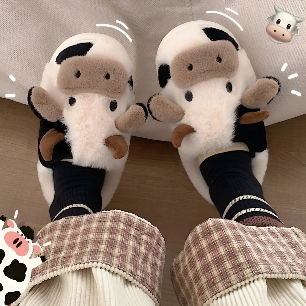 White women's cow slippers with plush faux fur upper and textured non-slip soles