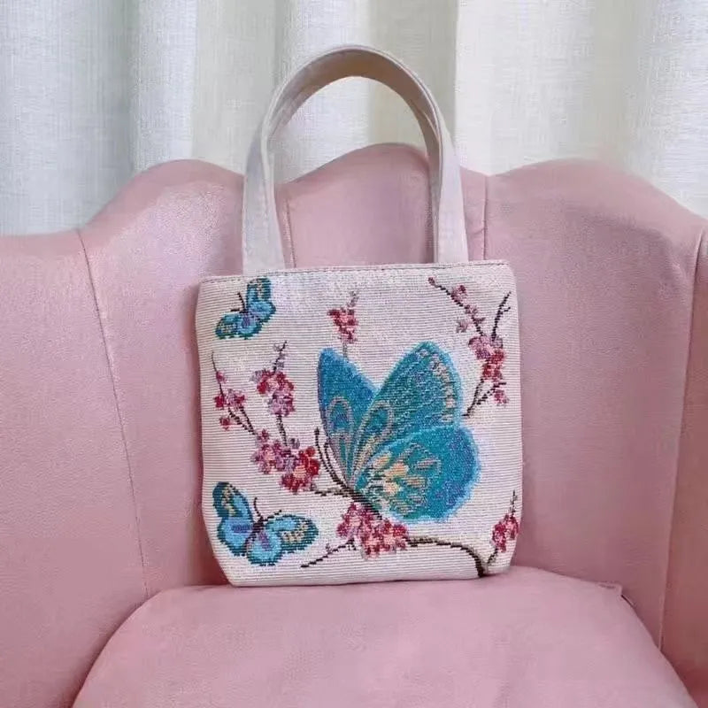 Double-sided gold wire embroidered canvas tote bag showing front and back design, available in multiple sizes and colours.