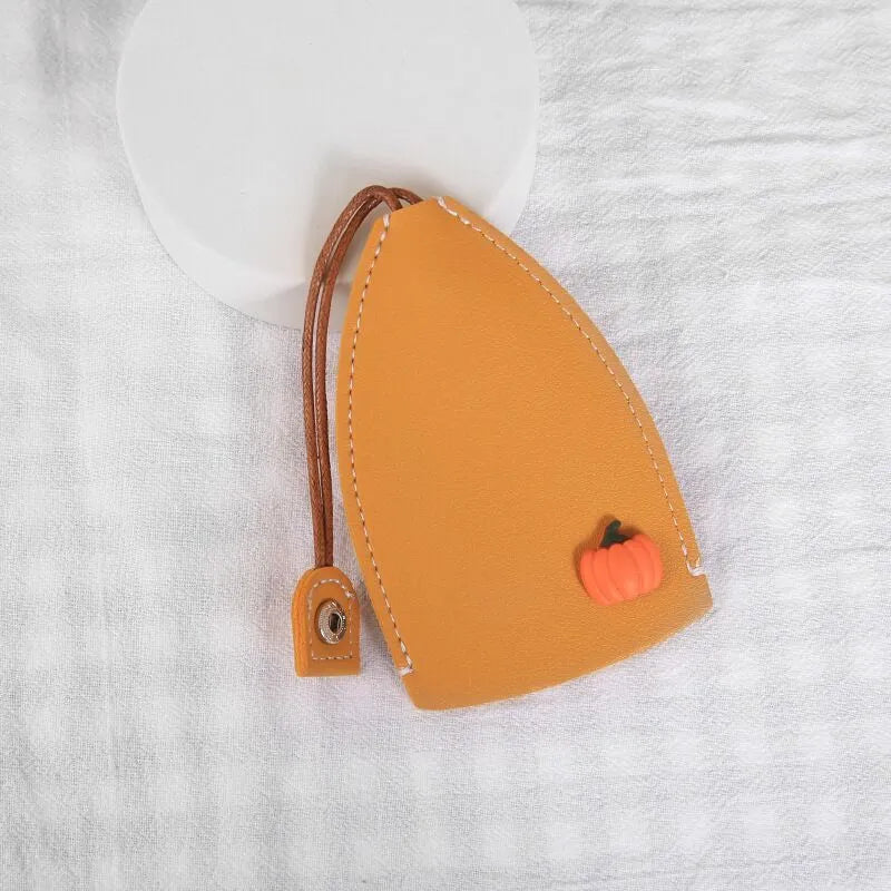 Cartoon-themed PU leather car key case with pull-out mechanism measuring 14x7.5 cm