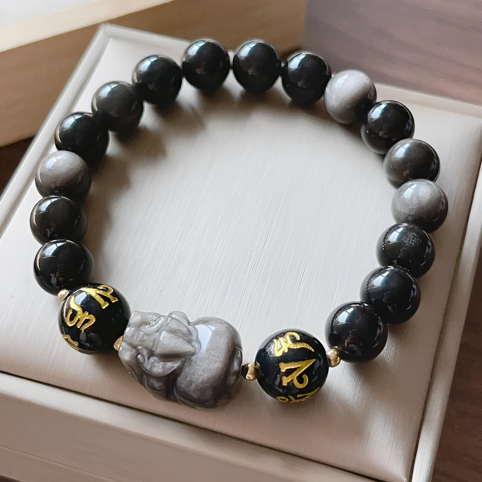 Men's silver bracelet with zodiac symbols and Chinese proverb beads on Silverstone