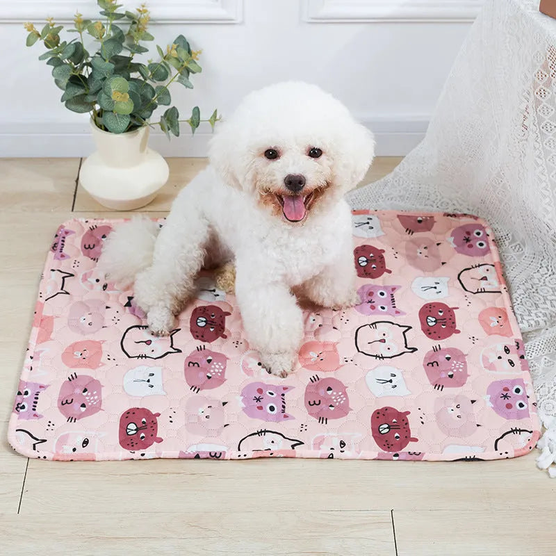 Reusable washable pet urine pad with colourful animal print design on cloth with waterproof base.