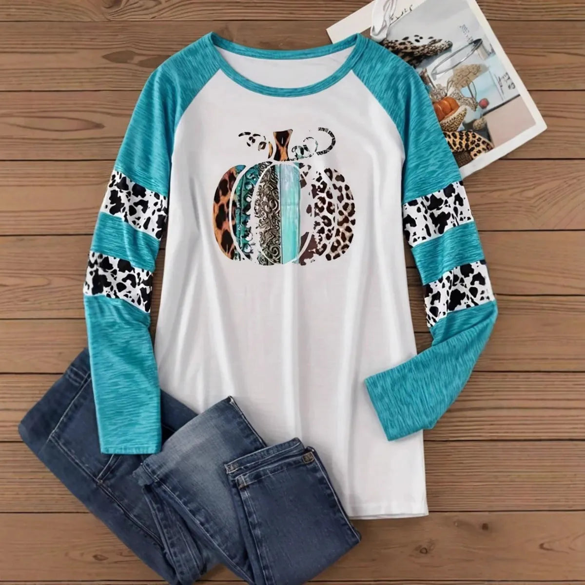 Sky blue casual t-shirt with a large 3D digital print of a Halloween pumpkin on the front.