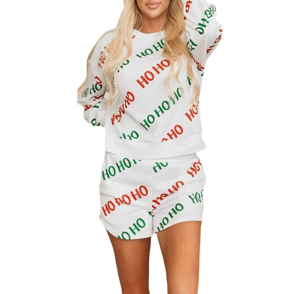 White women's two-piece suit with long sleeves and printed trousers featuring letter pattern