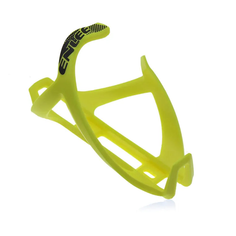 TPR plastic mountain bike water bottle cage in fluorescent yellow, mounted on a bike frame.