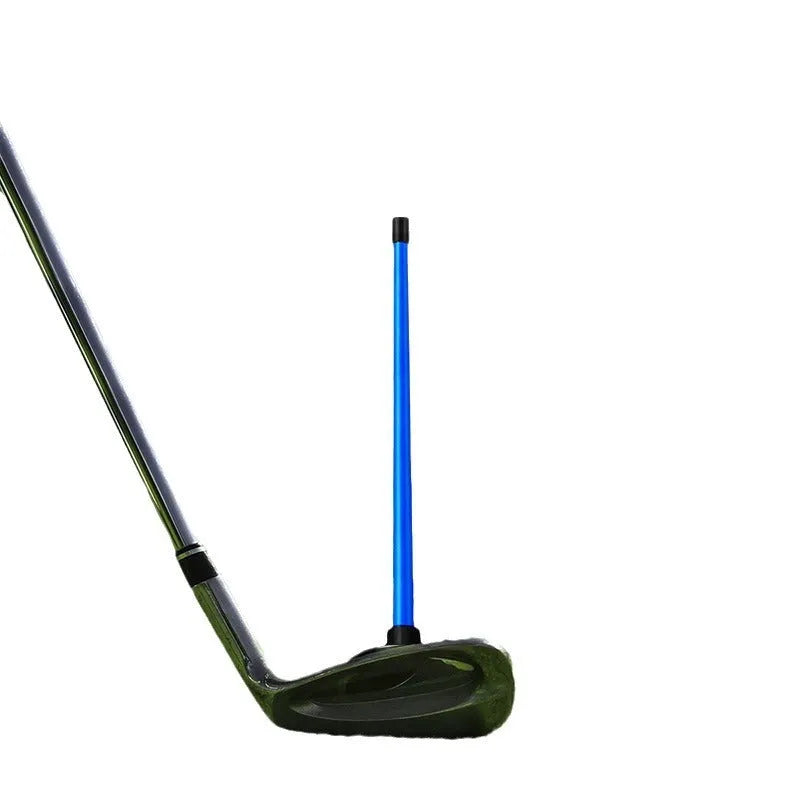 Red aluminium golf swing alignment trainer with magnetic directional pointer on green background