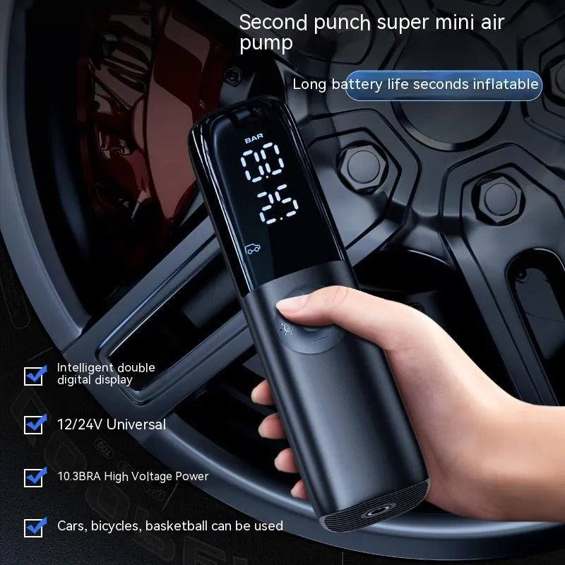Black portable electric car air pump with built-in pressure gauge and power plug for 12V/24V vehicles.