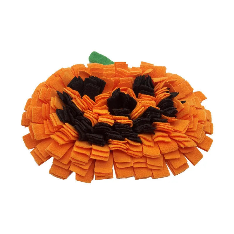 Orange pumpkin-shaped pet smell mat made from polar fleece cloth for dog and cat slow feeding.