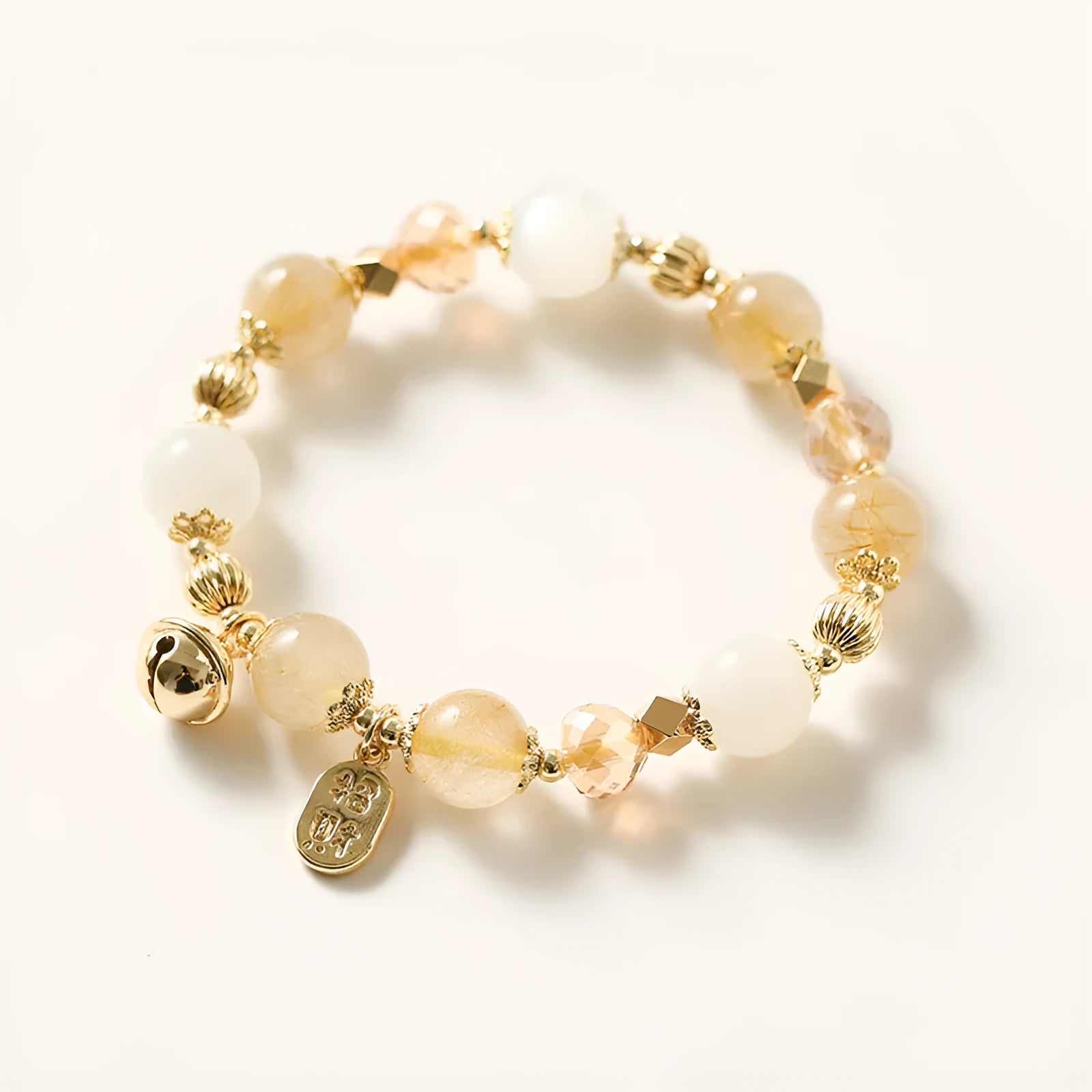 Gold rutilated quartz bracelet with electroplated finish and Korean style design
