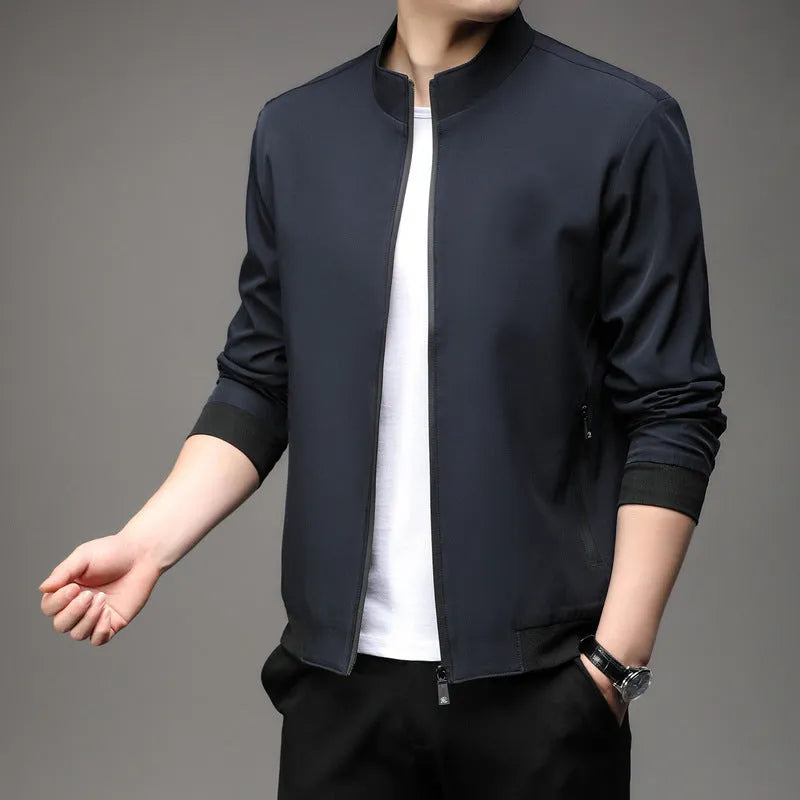 Man wearing black loose-fit Korean style autumn jacket with zip pockets