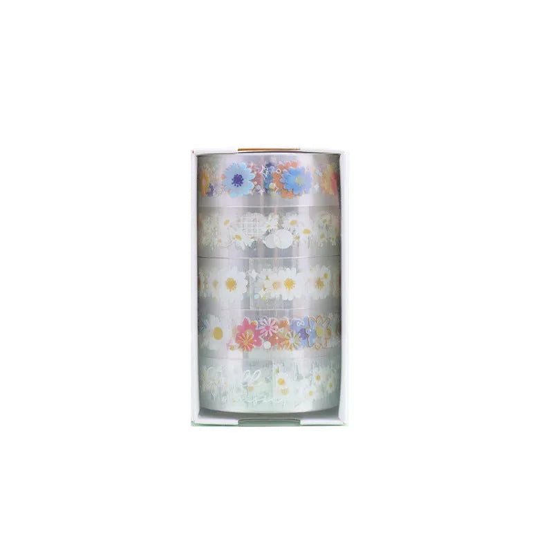 Five rolls of Midsummer Daisy coloured decorative adhesive tape with cartoon design on transparent PET base.