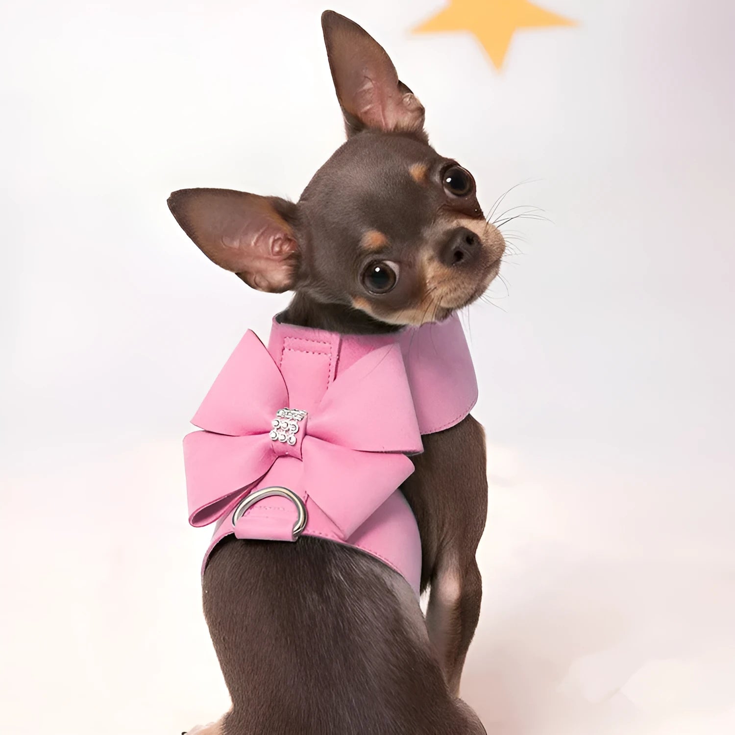 Adjustable puppy chest strap with bowknot design in microfiber material showing pink blue orange colour options
