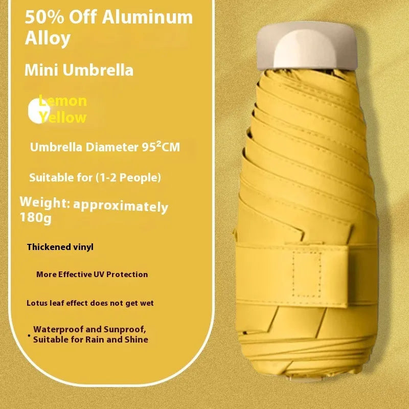 Closed five-fold manual umbrella showing one of eight colour options: beige, black, blue, dark green, navy blue, pink, yellow, or purple.