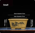 Large purple clay Chinese style flower pot for indoor bonsai or plants.