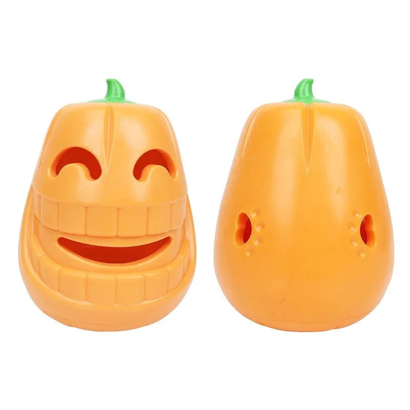 Orange Halloween pumpkin shaped dog chew toy with treat-dispensing funnel opening