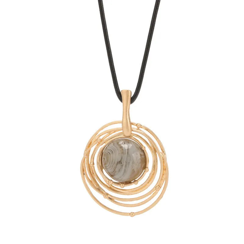 Vintage women's geometric sweater chain necklace with gold alloy pendant and snakeskin wax rope chain.