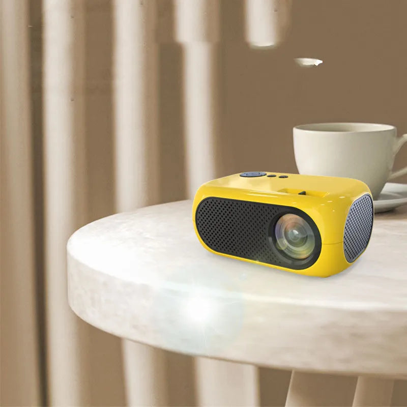 M24 micro mini portable projector in gold colour showing compact size and lightweight design