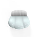 Blue paw-shaped deshedding brush for pets on a white background.