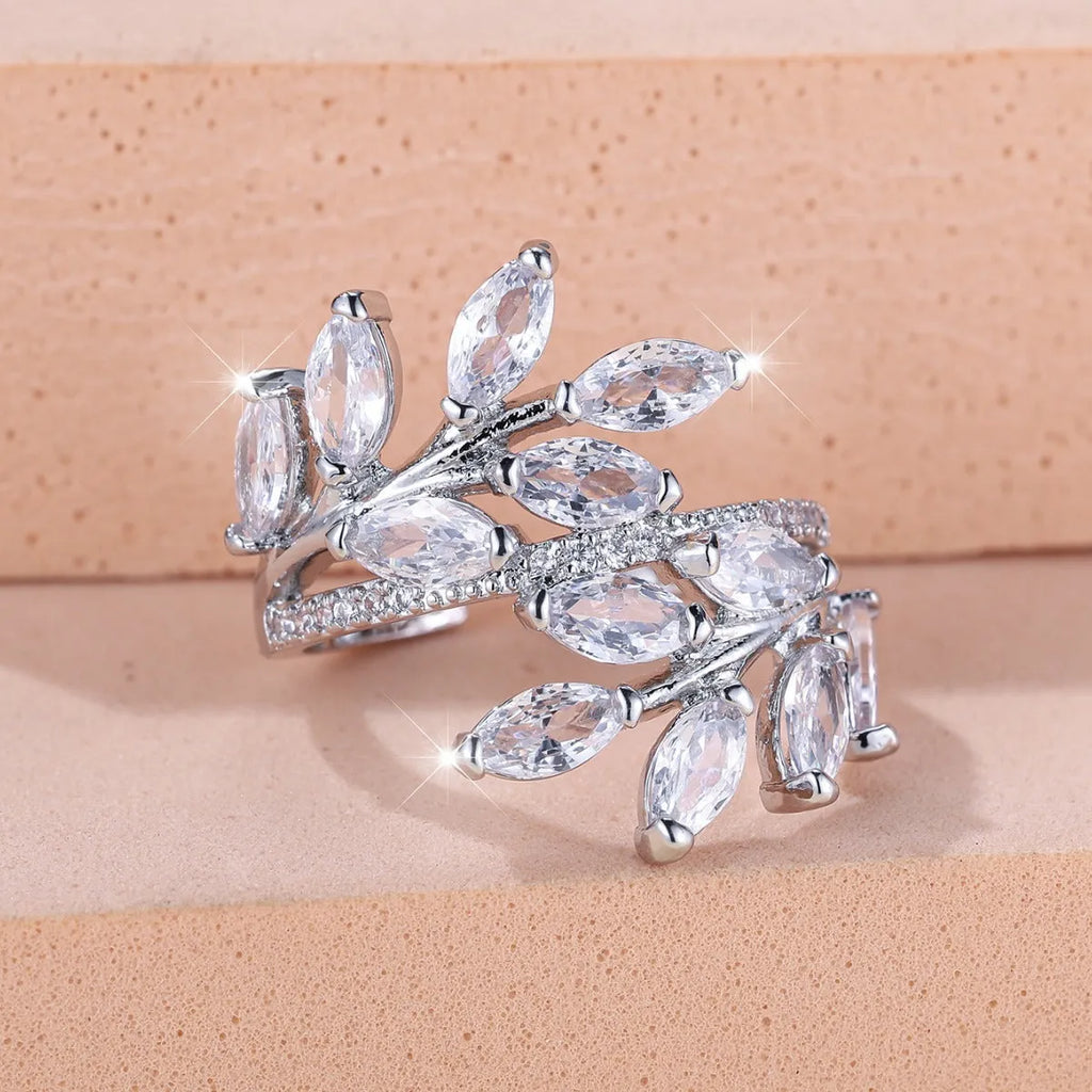 Adjustable copper ring with horse eye zircon leaf design in rose gold sapphire blue colour