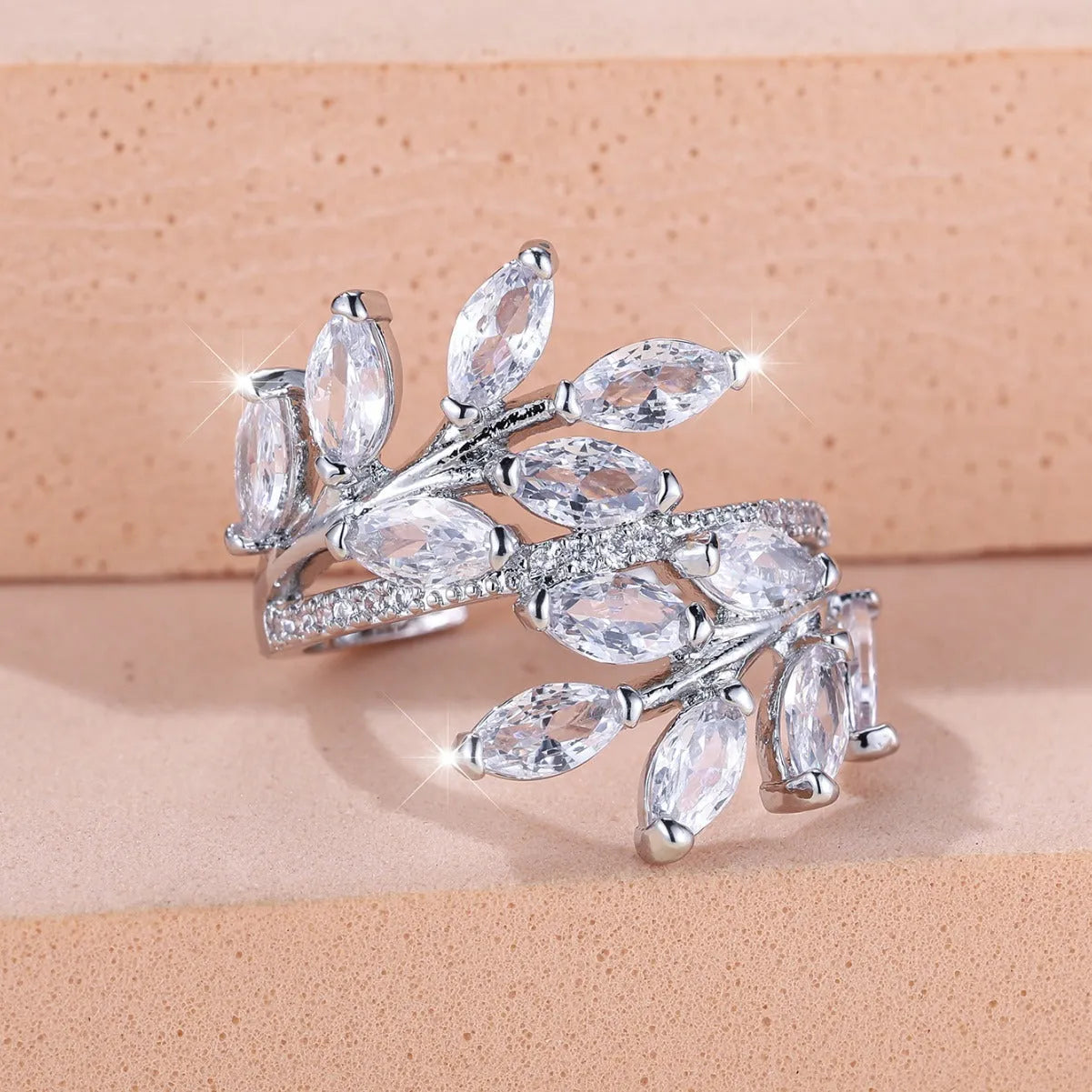 Adjustable copper ring with horse eye zircon leaf design in rose gold sapphire blue colour