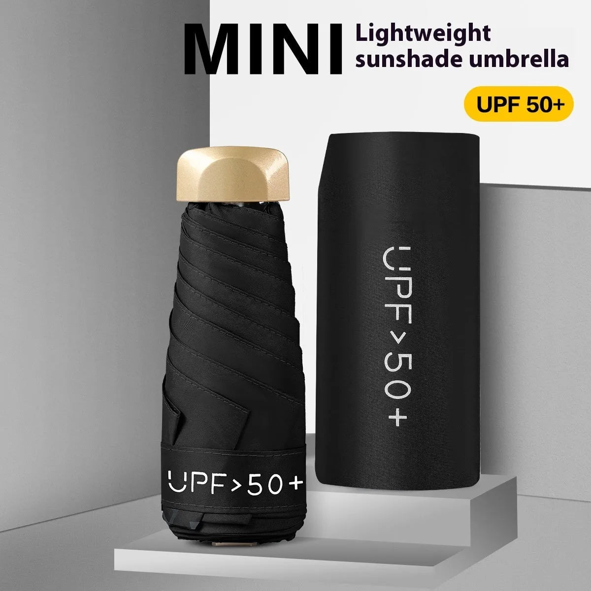 Five-fold mini pocket sun umbrella with rubber handle shown in open position