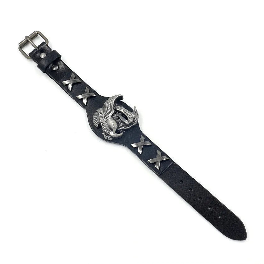 Black geometric leather bracelet with Eagle watch-button detail, showing tapered width.