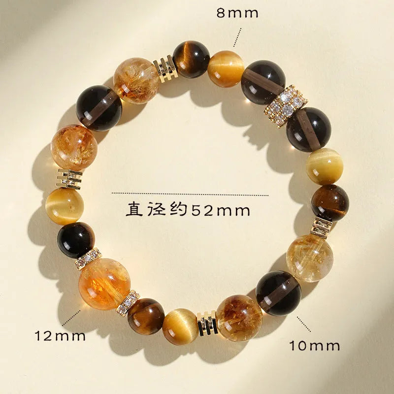 Women's natural yellow 10mm artificial crystal string beads bracelet on wrist.
